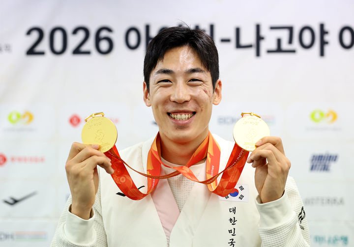 장민호, 장애인 아시안게임에서 금메달과 세계신기록 달성