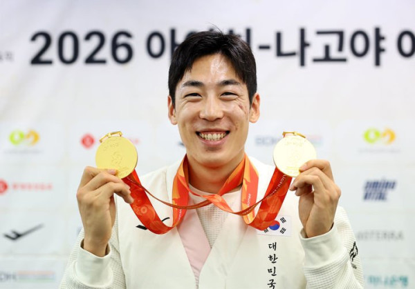 장민호, 장애인 아시안게임에서 금메달과 세계신기록 달성